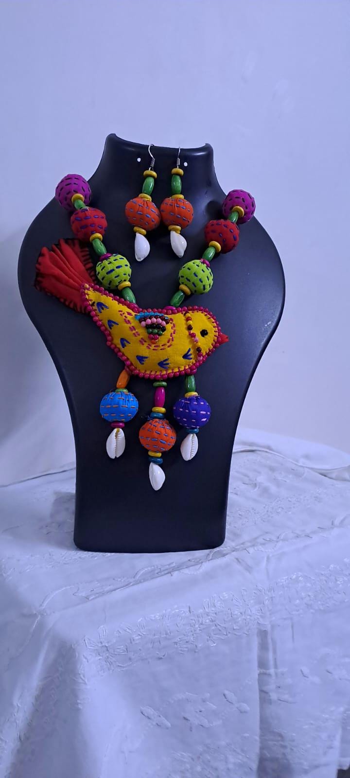 Exclusive fabric necklace with embroidered yellow fabric bird pendant and fabric beads n matching beads