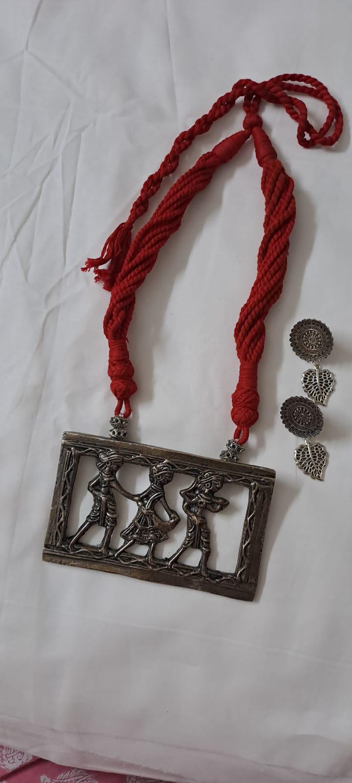 Maroon thread necklace set with dokra pendant n matching earrings