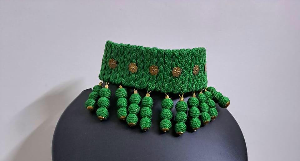 Green braided choker necklace set with fringes and matching earrings