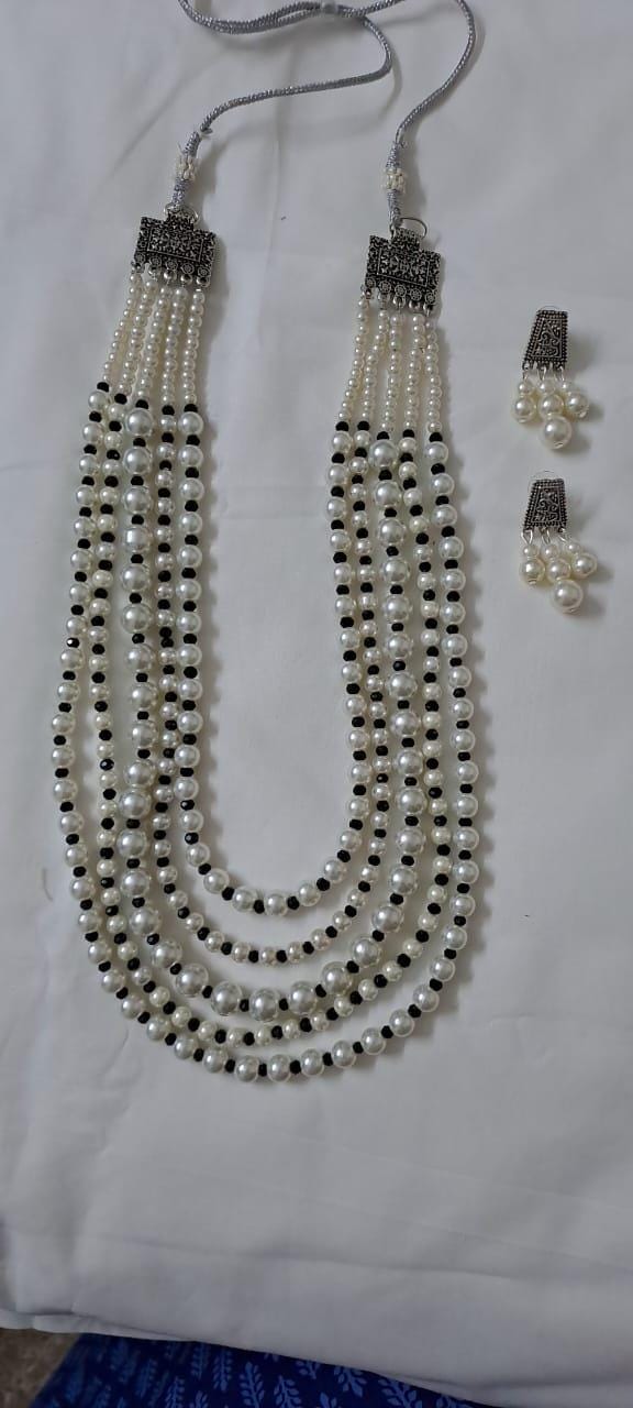 Multi layered glass pearl necklace set with matching earrings