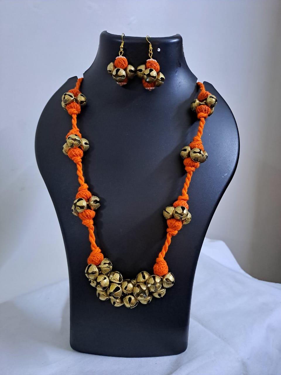Orang thread necklace set with trinkets n matching earrings