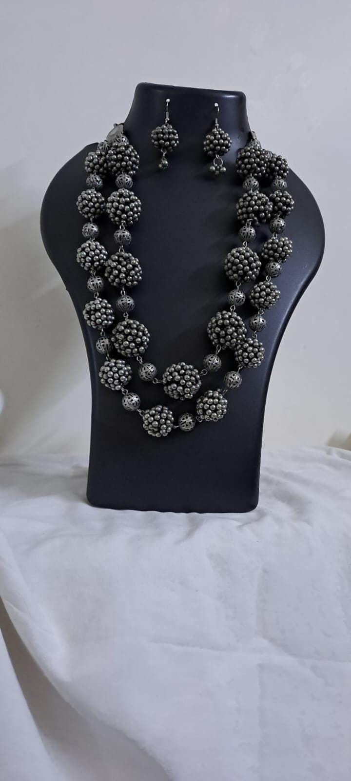 Exclusive silver oxidised long chain set with matching earrings