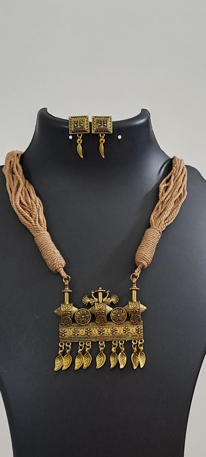 Peach thread necklace with Golden oxidised traditional pendant
