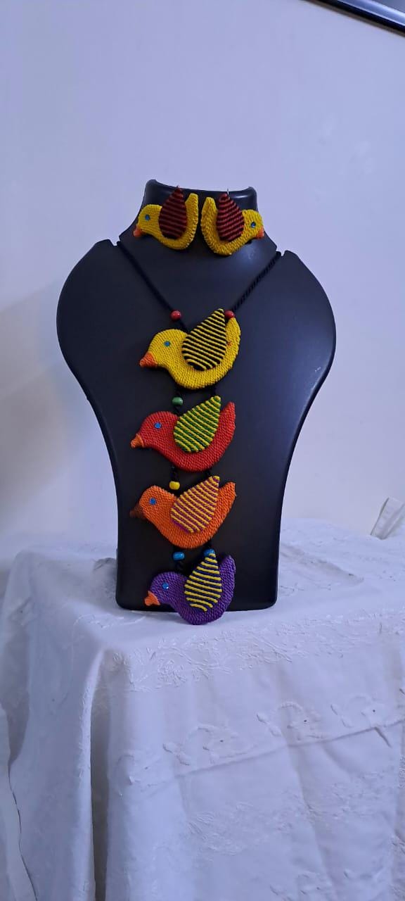 Multi coloured bird necklace and matching earrings