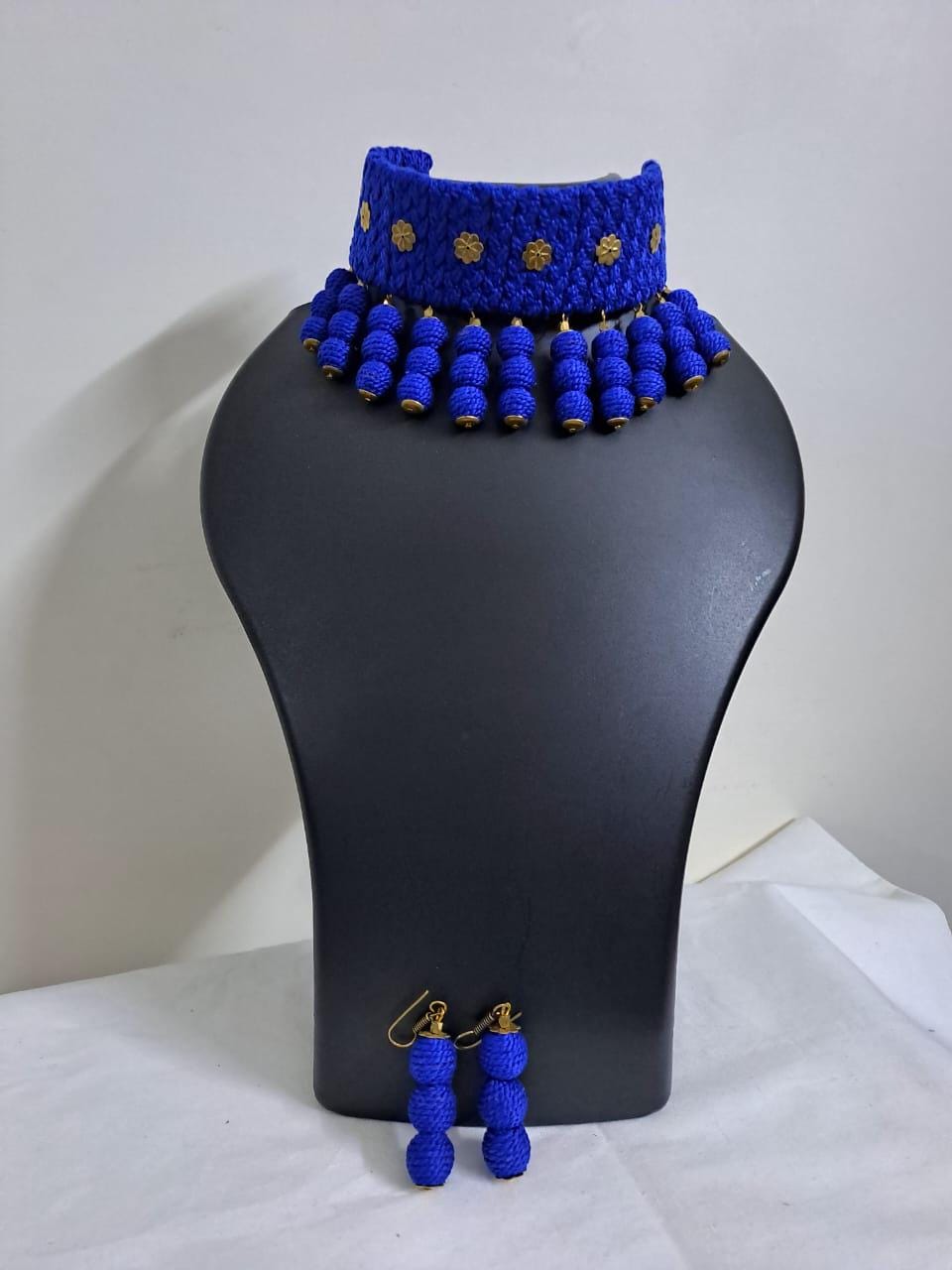 Blue braided choker necklace set with fringes and matching earrings