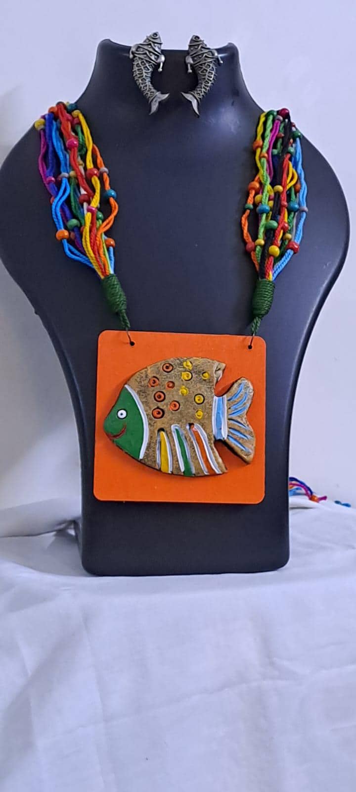 Terracotta fish pendant and thread necklace