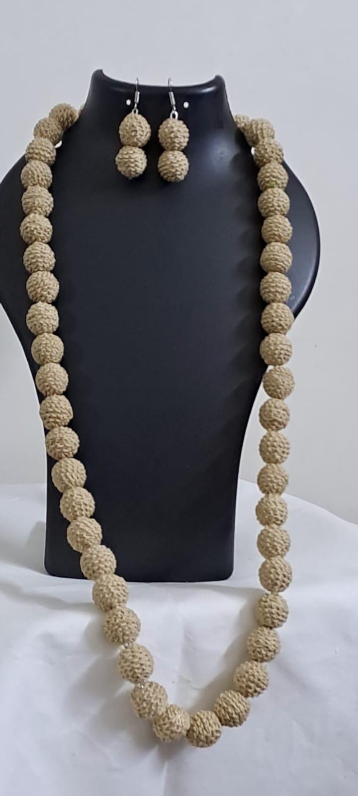 Exclusive beige colour thread beads long necklace set with matching earrings