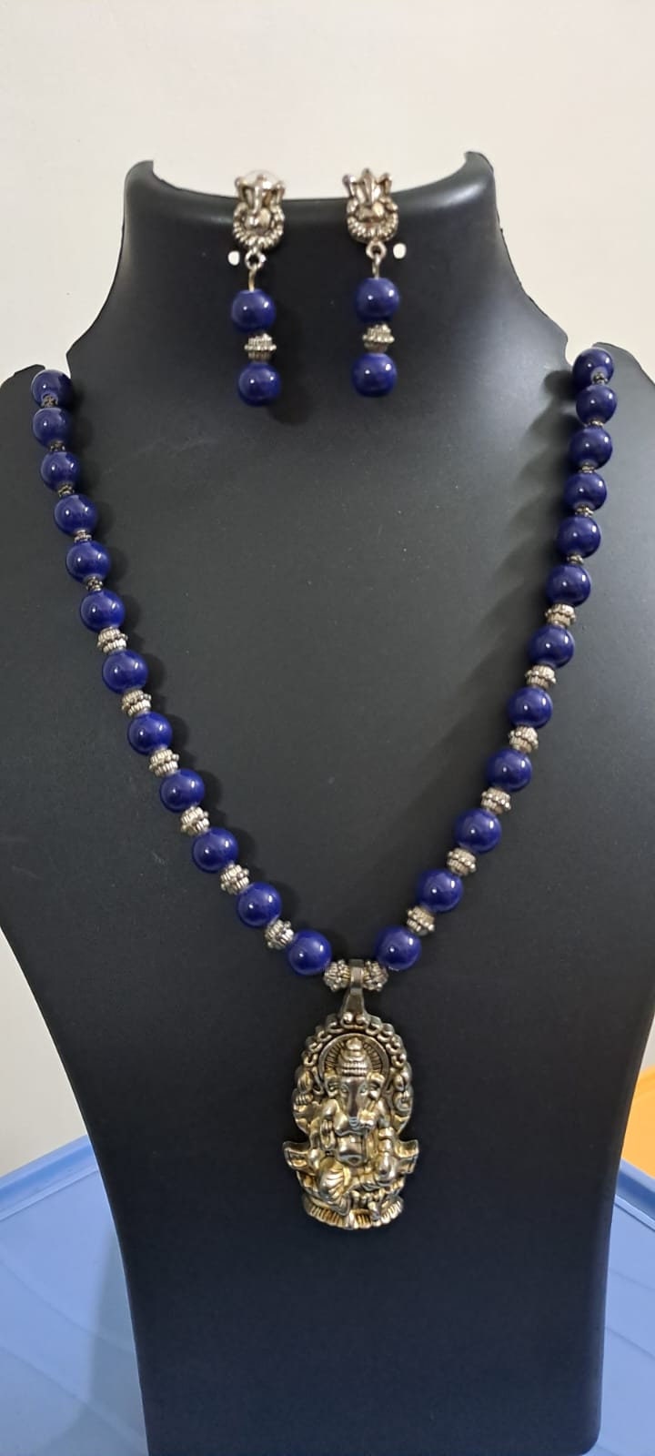Blue glass beads necklace with oxidised silver ganesha pendant