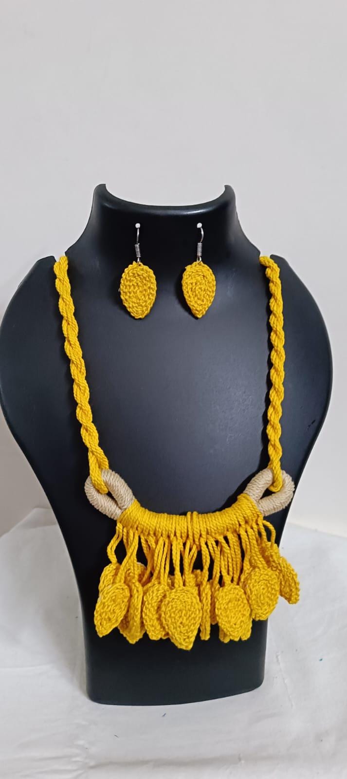 Yellow Crochet thread necklace set with leaf fringes and matching earrings