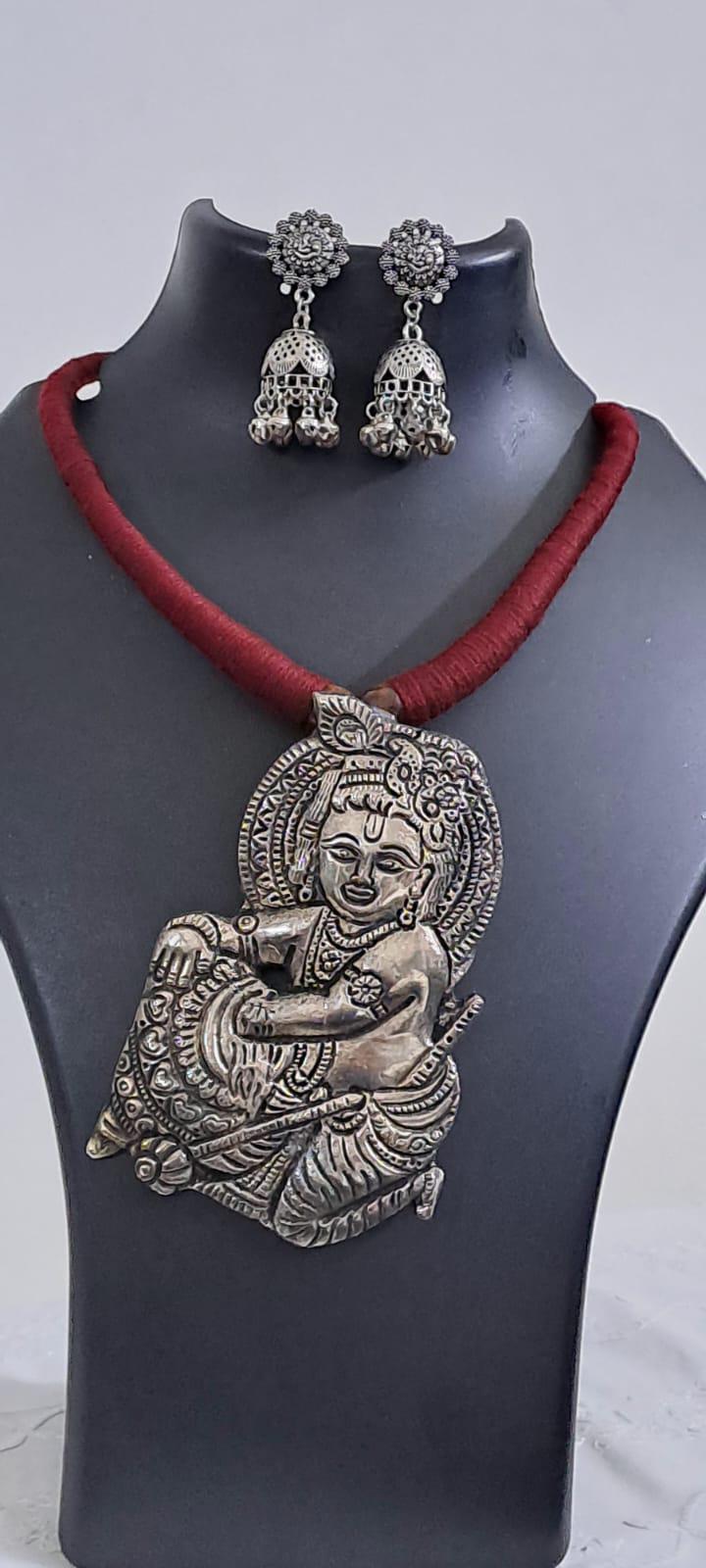 Maroon thread necklace with silver oxidised krishna pendant