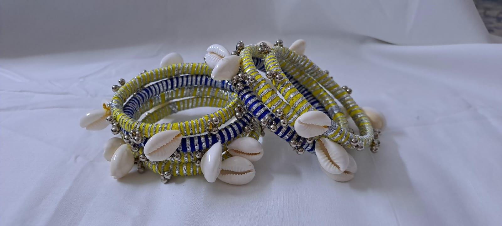 Yellow and blue colour traditional zari thread and kori bangles (set of 7 bangles)