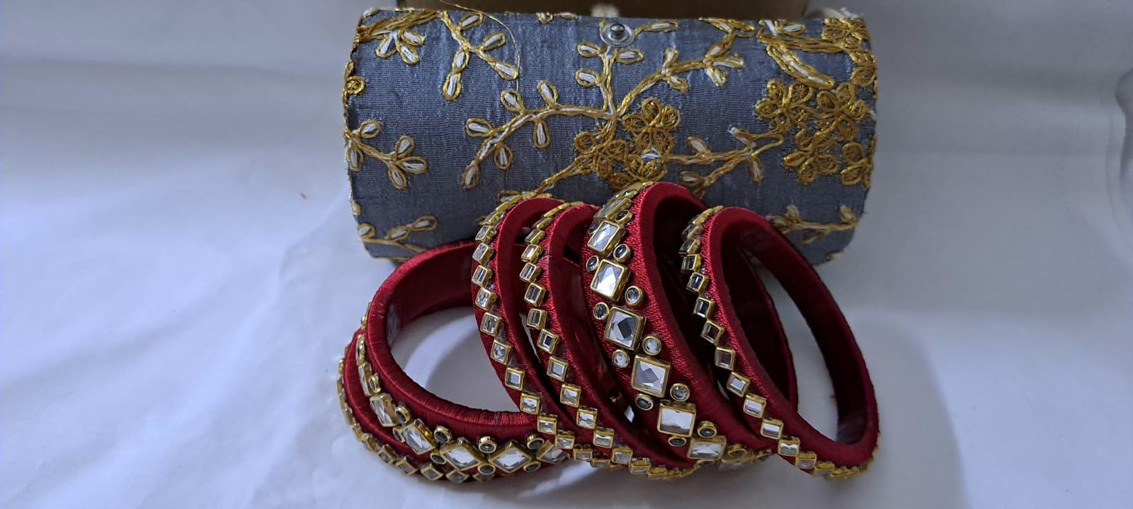 Maroon colour traditional thread kundan bangles with zari bangle box