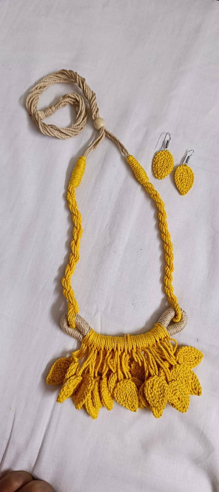Yellow Crochet thread necklace set with leaf fringes and matching earrings
