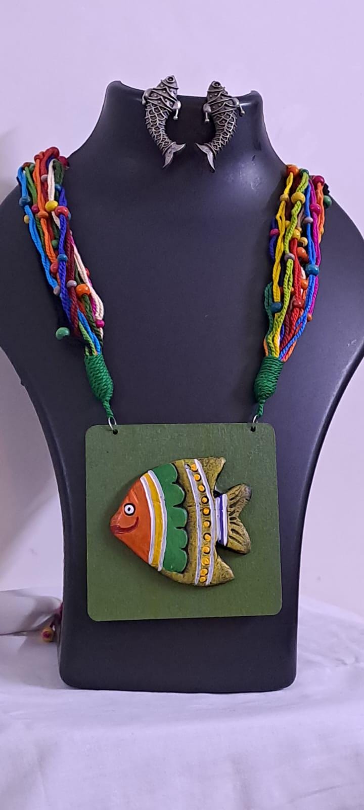 Terracotta fish pendant and thread necklace