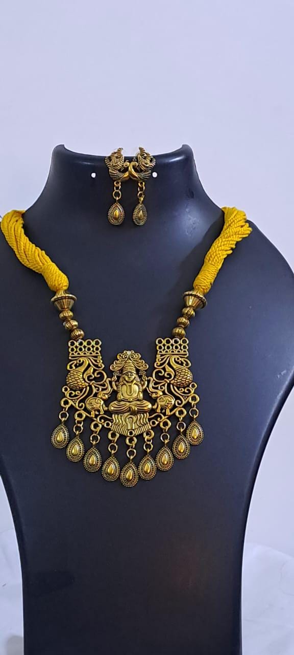 Yellow thread necklace with Golden oxidised traditional pendant