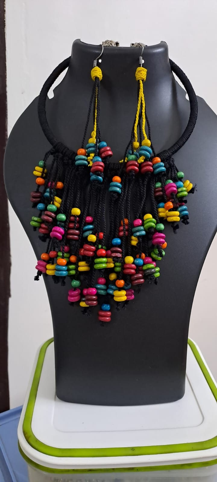Exclusive black thread neckband with fringes and matching earrings.