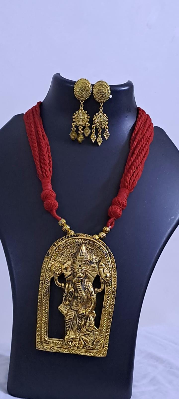 Maroon thread necklace with golden oxidised ganesha pendant