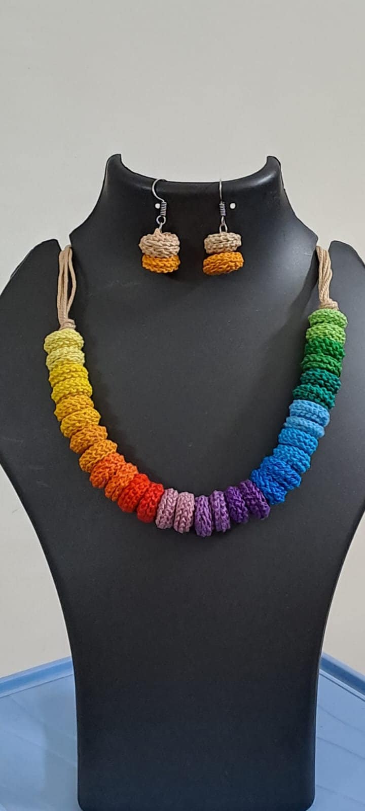 Exclusive multi coloured crochet necklace with colouful matching earrings.