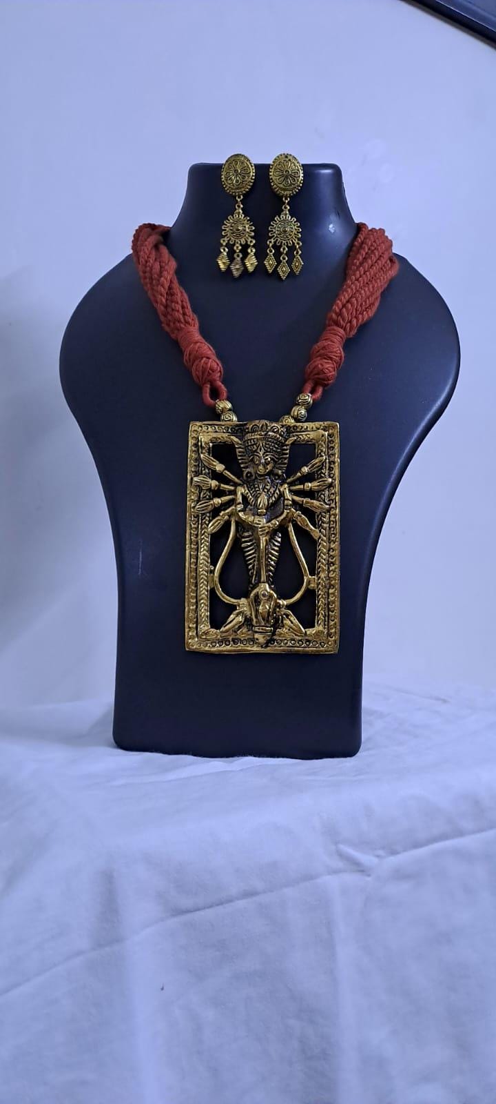 Brown  thread necklace with oxidised golden durga pendant