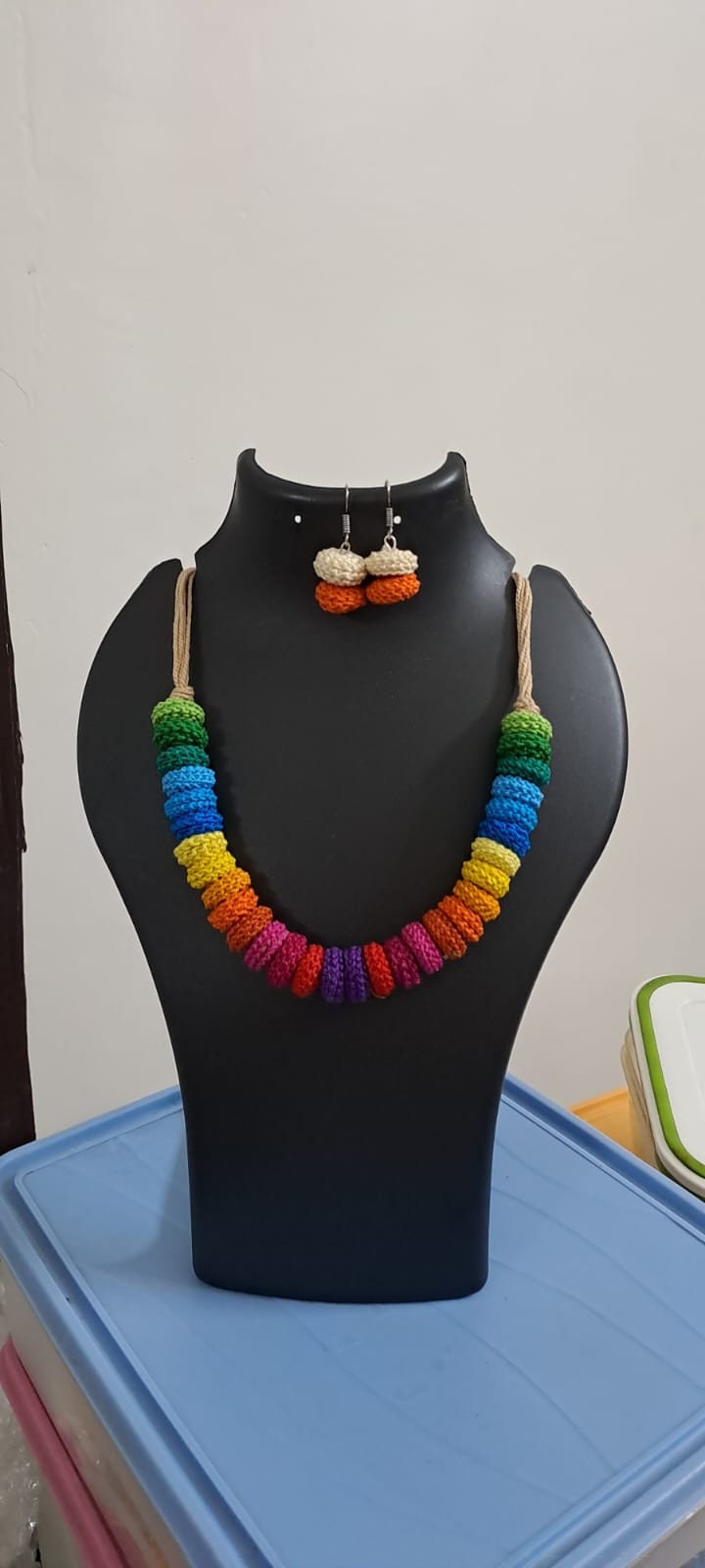 Exclusive multi coloured crochet necklace with colouful matching earrings.