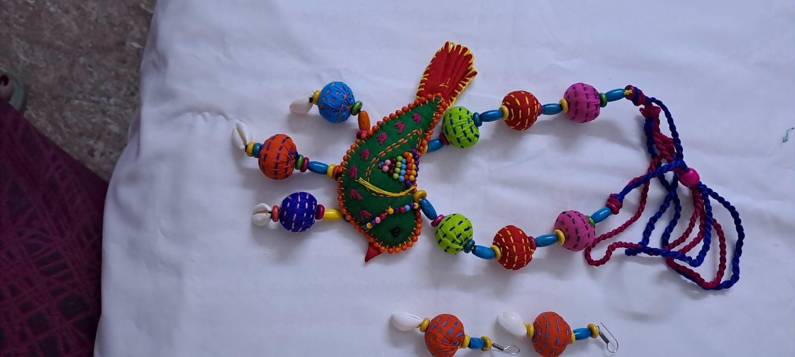 Exclusive fabric necklace with embroidered green fabric bird pendant and fabric beads n matching beads
