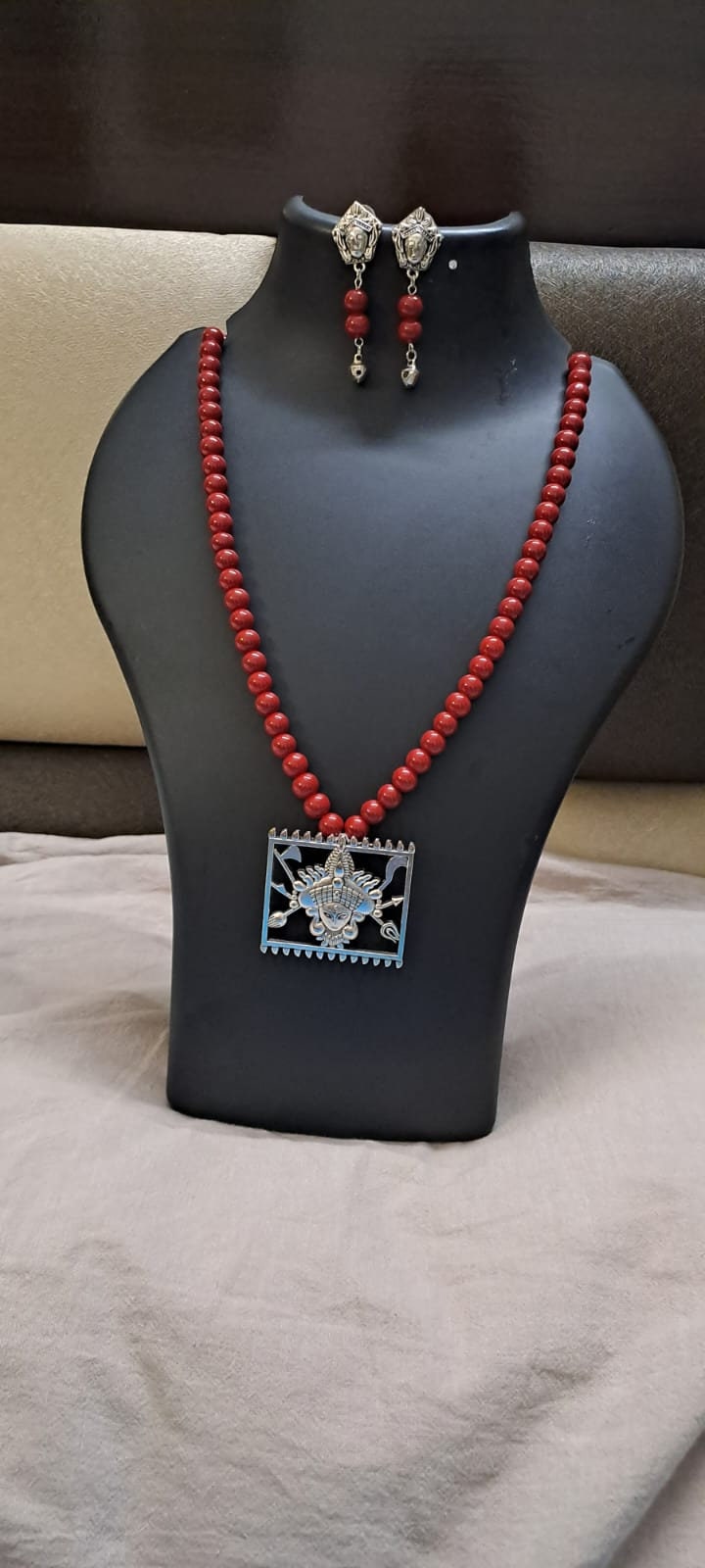 Red glass beads necklace with oxidised silver durga pendant