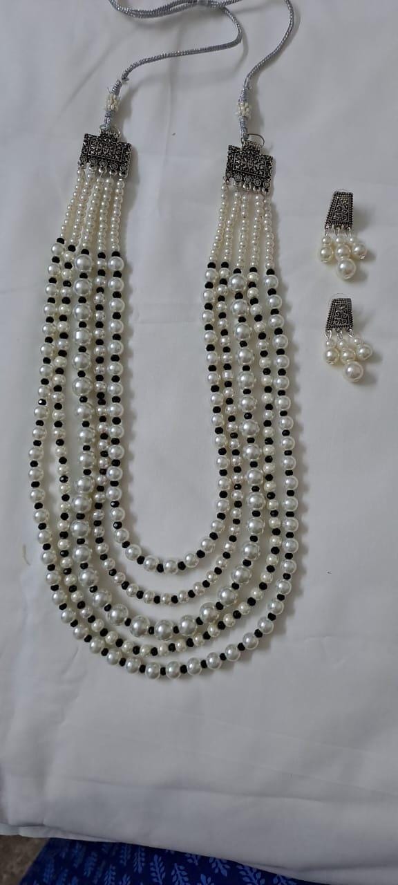 Multi layered glass pearl necklace set with matching earrings