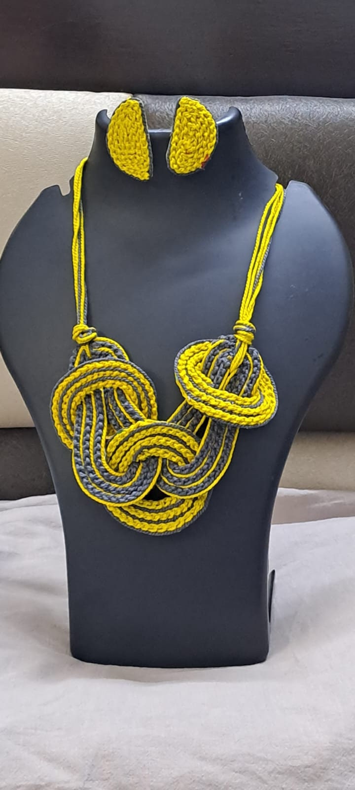 Celtic knot thread necklace with matching thread earrings.