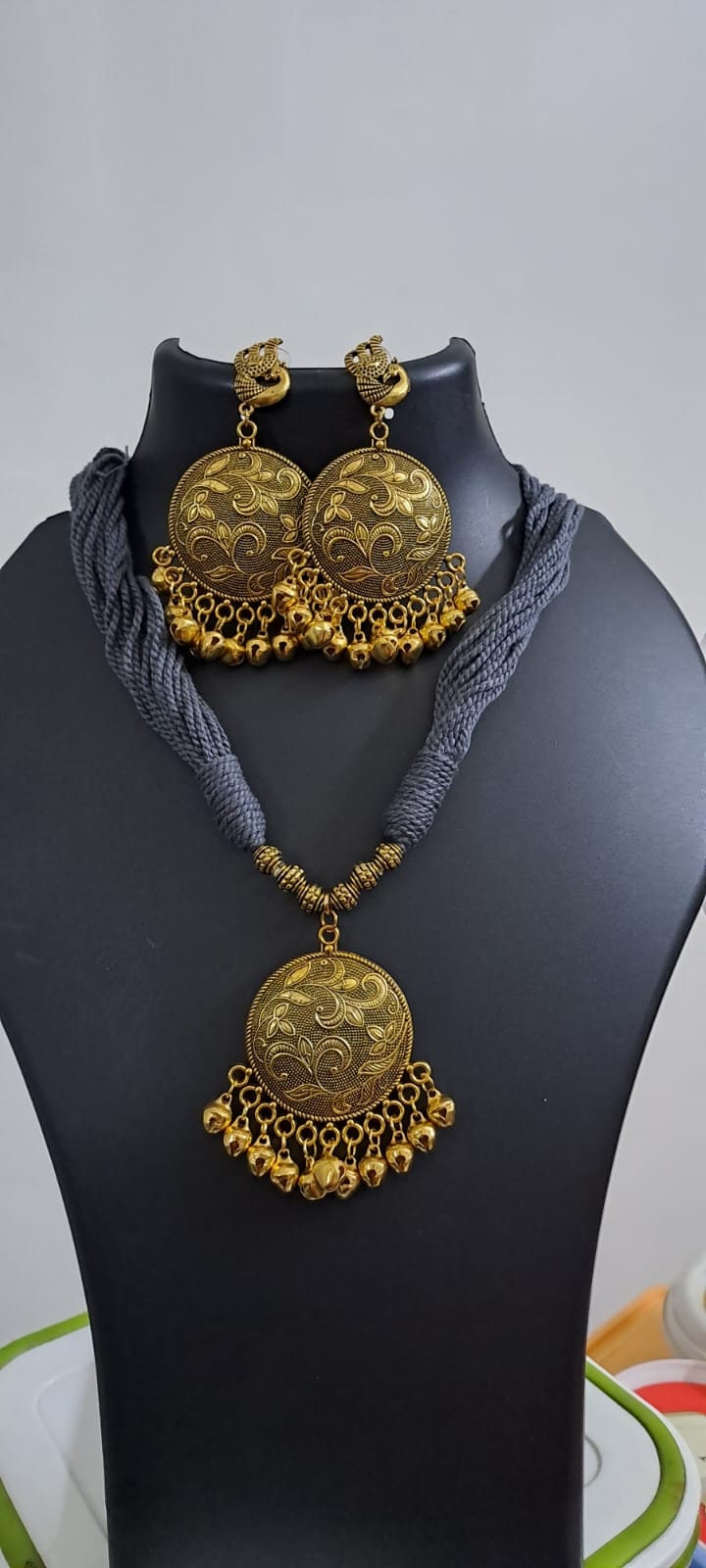 Grey thread necklace with Golden oxidised traditional pendant