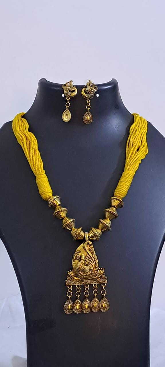 Yellow thread necklace with Golden oxidised traditional pendant