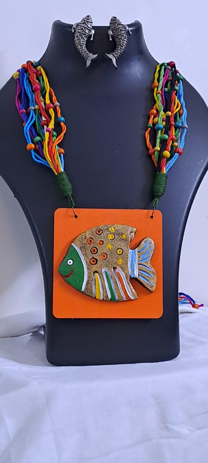 Terracotta fish pendant and thread necklace