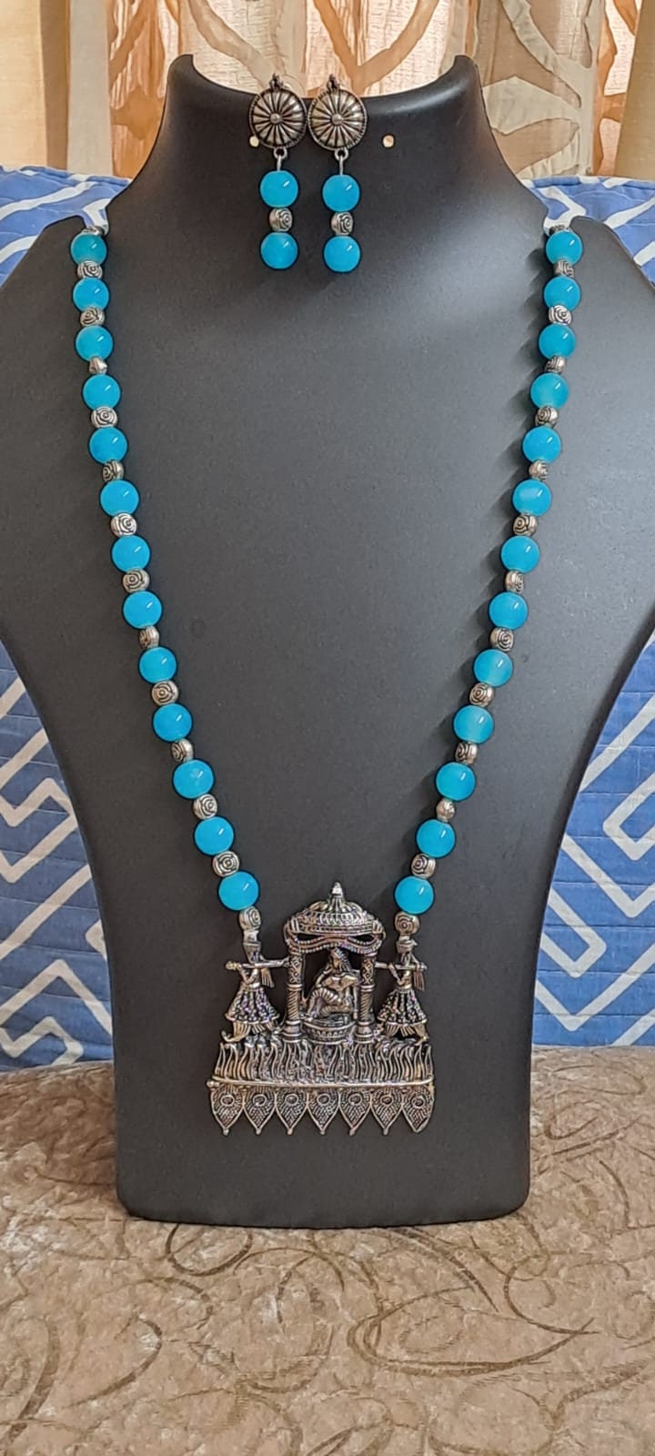 Glass beads necklace with oxidised silver pendant