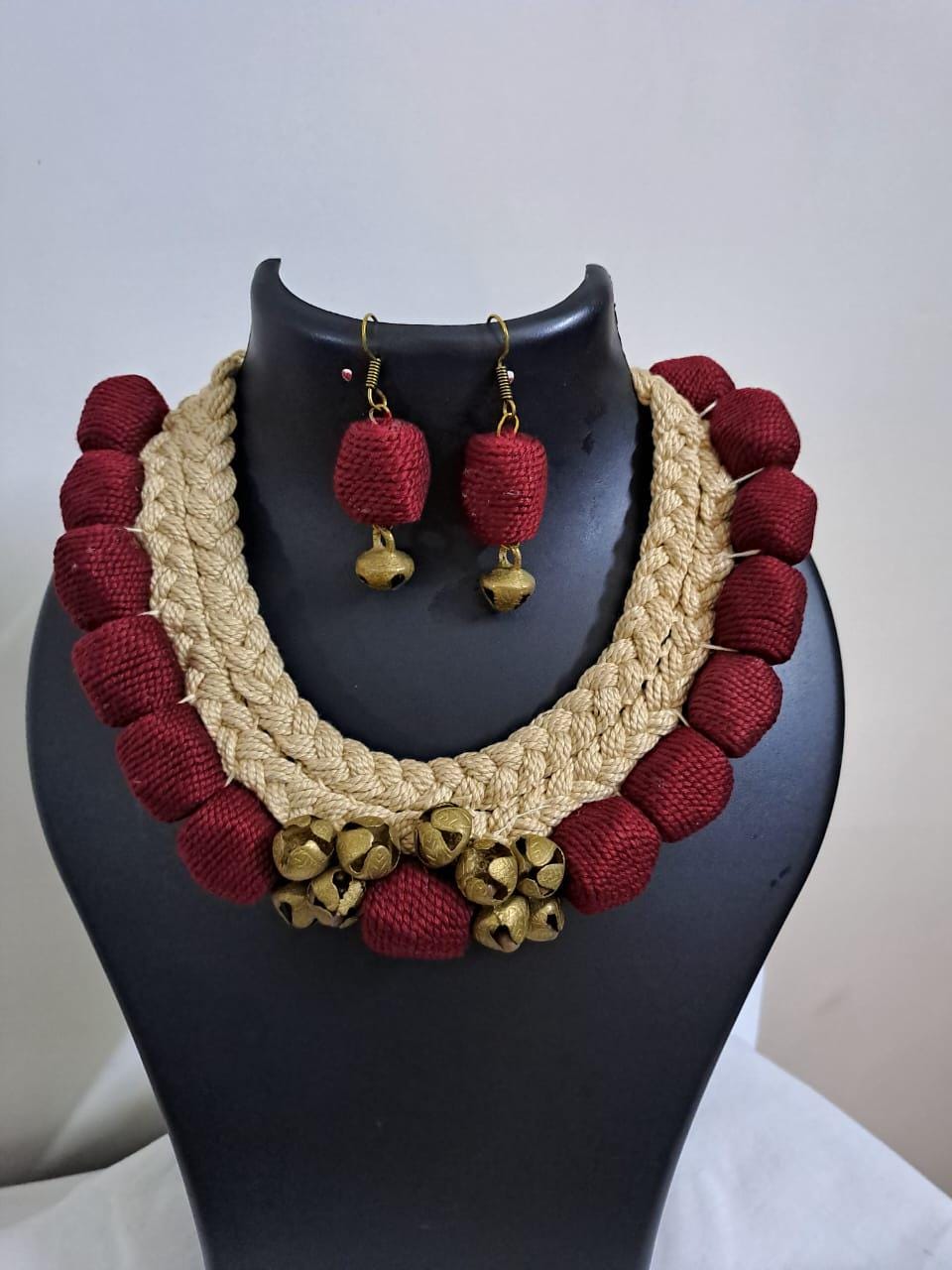 Handmade braided thread necklace set with trinkets and  matching earrings