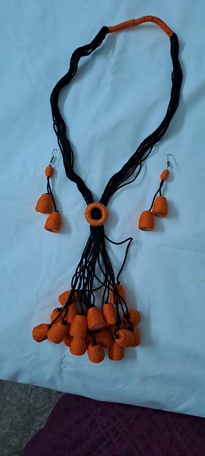 Orange thread necklace with multiple thread aparajita flower fringes n matching earrings