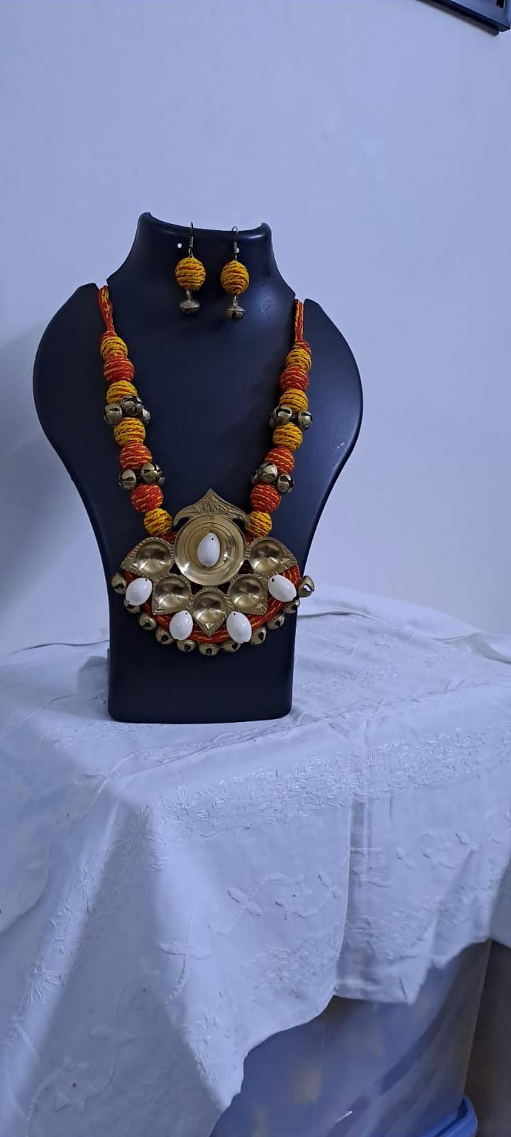 Red yellow thread beads necklace set with dokra pendant n matching earrings