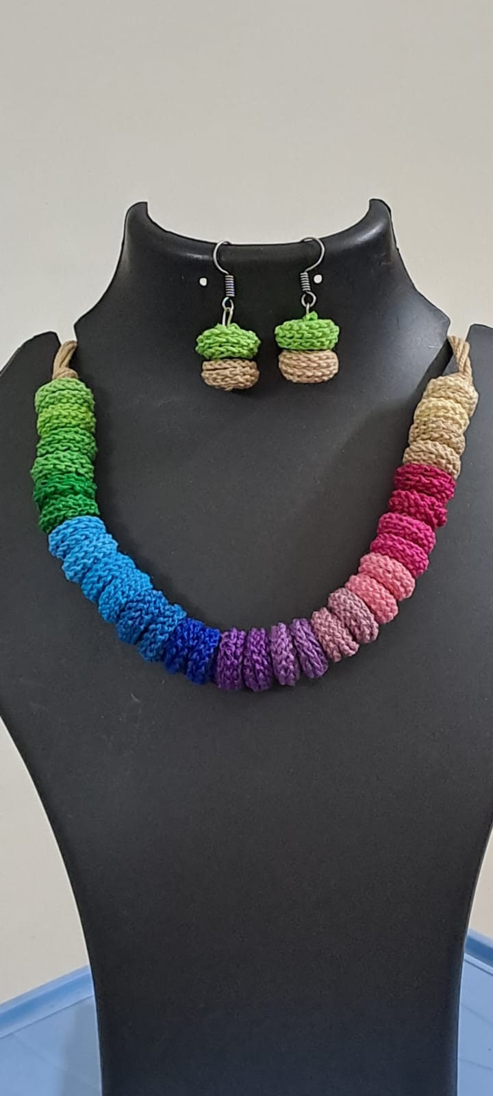 Exclusive multi coloured crochet necklace with colouful matching earrings.