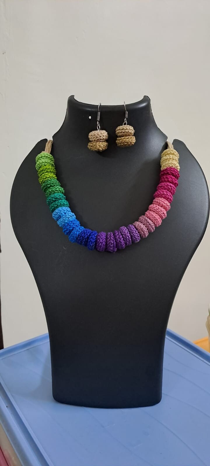 Exclusive multi coloured crochet necklace with colouful matching earrings.