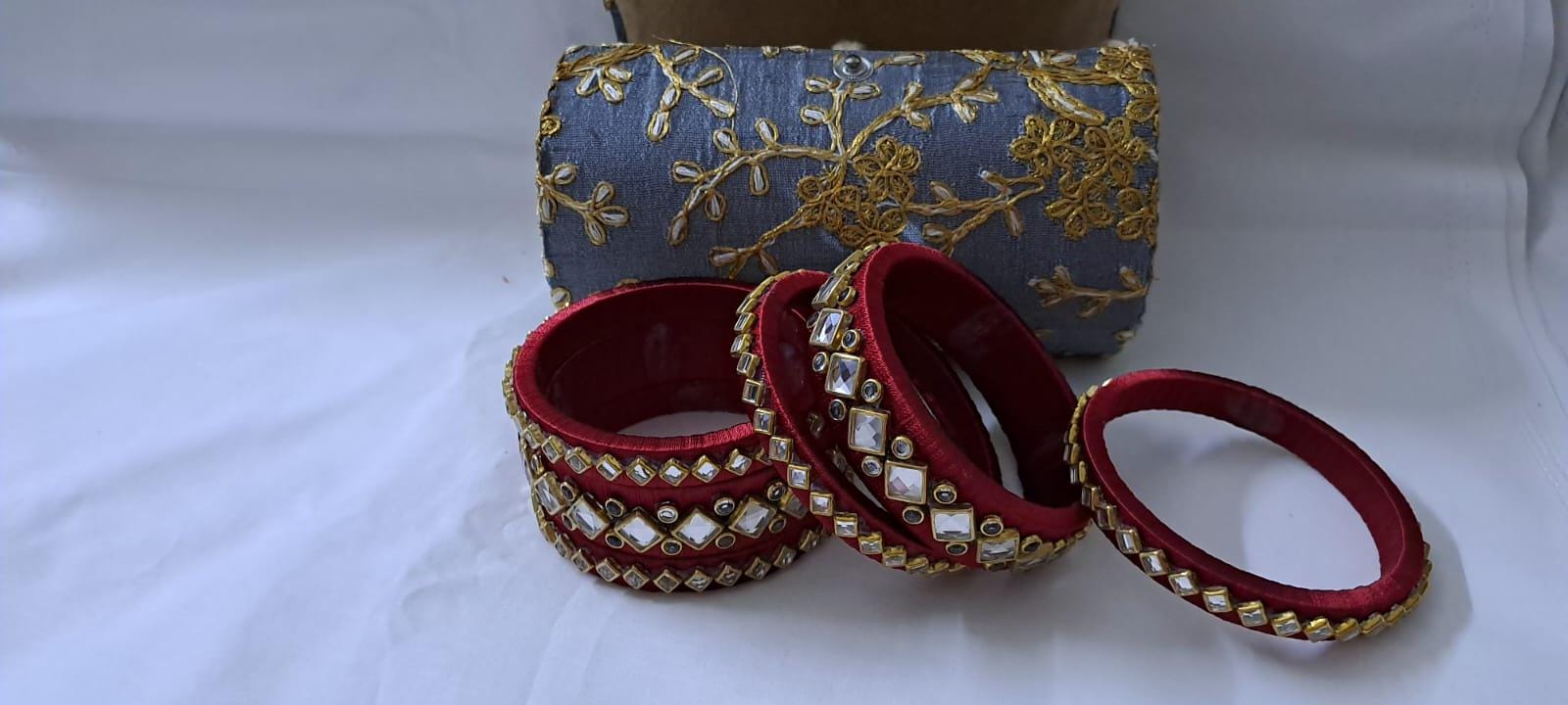 Maroon colour traditional thread kundan bangles with zari bangle box