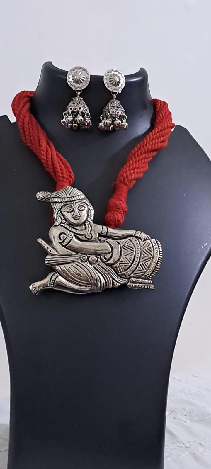 Red thread necklace with silver oxidised krishna pendant