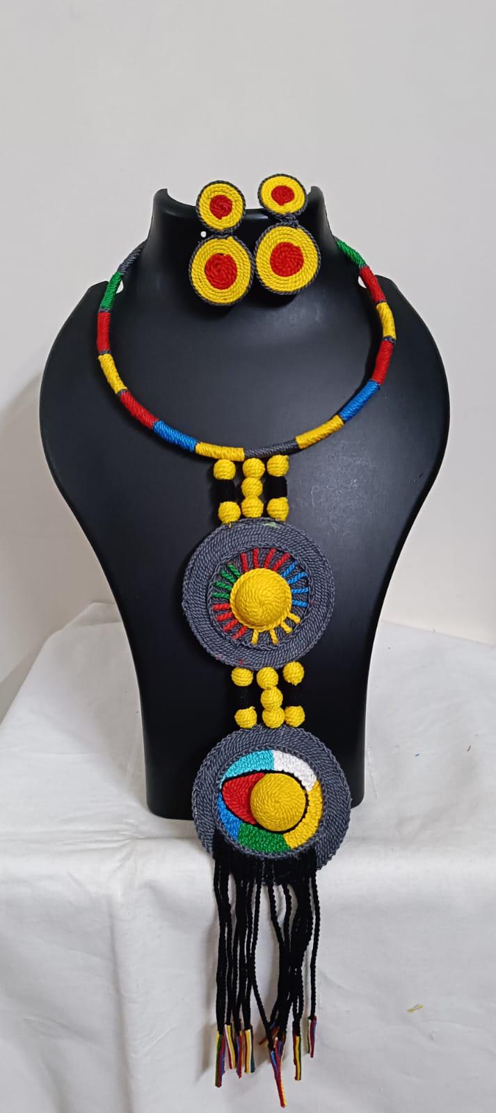 Exclusive multicoloured hasuli thread necklace set with round thread pendant n matching earrings