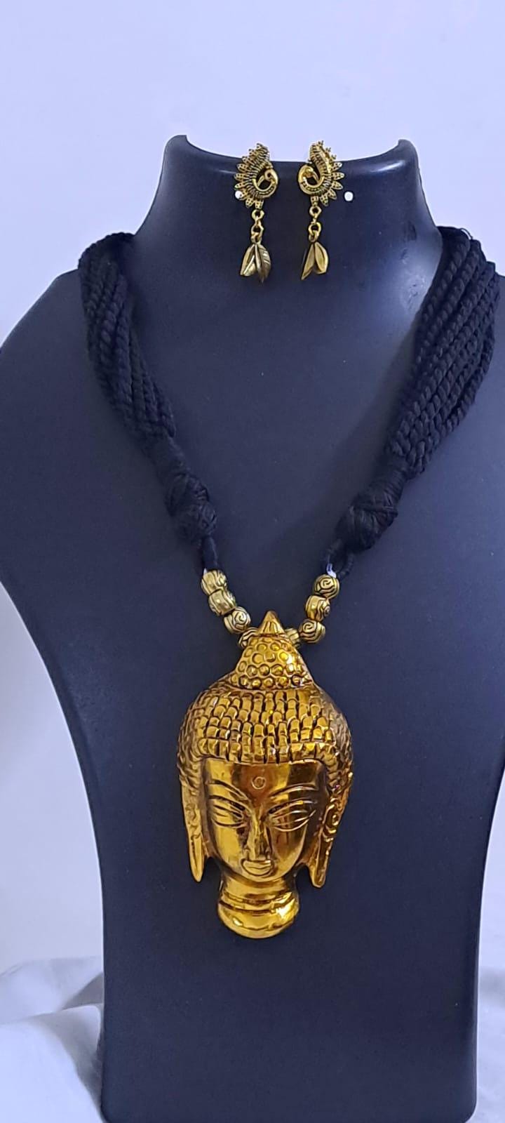 Black thread necklace with oxidised golden buddha pendant
