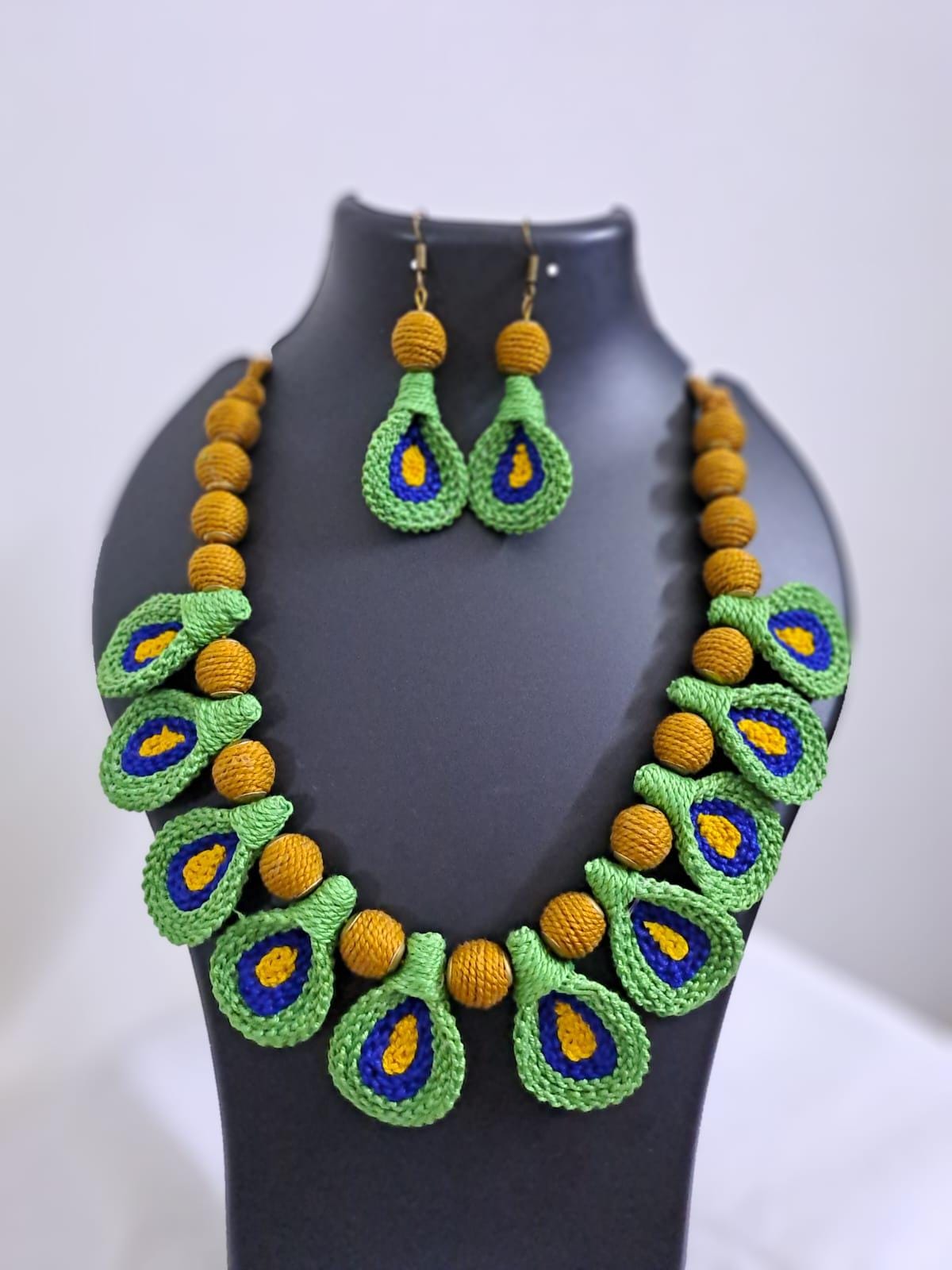 Green n yellow thread necklace with matching thread earrings.