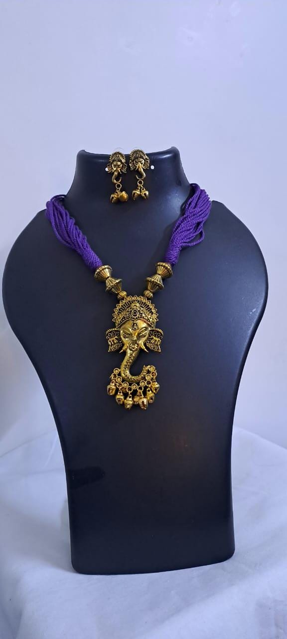 Purple thread necklace with Golden oxidised traditional pendant