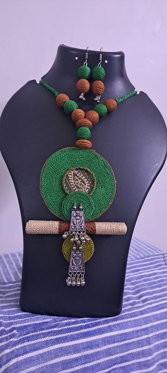 Exclusive green n brown thread beads necklace set with round thread n silver oxidised pendant n matching earrings