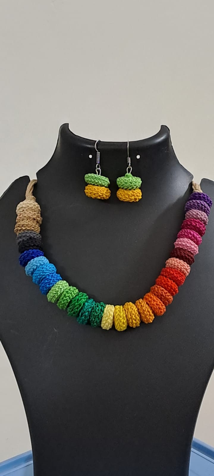 Exclusive multi coloured crochet necklace with colouful matching earrings.
