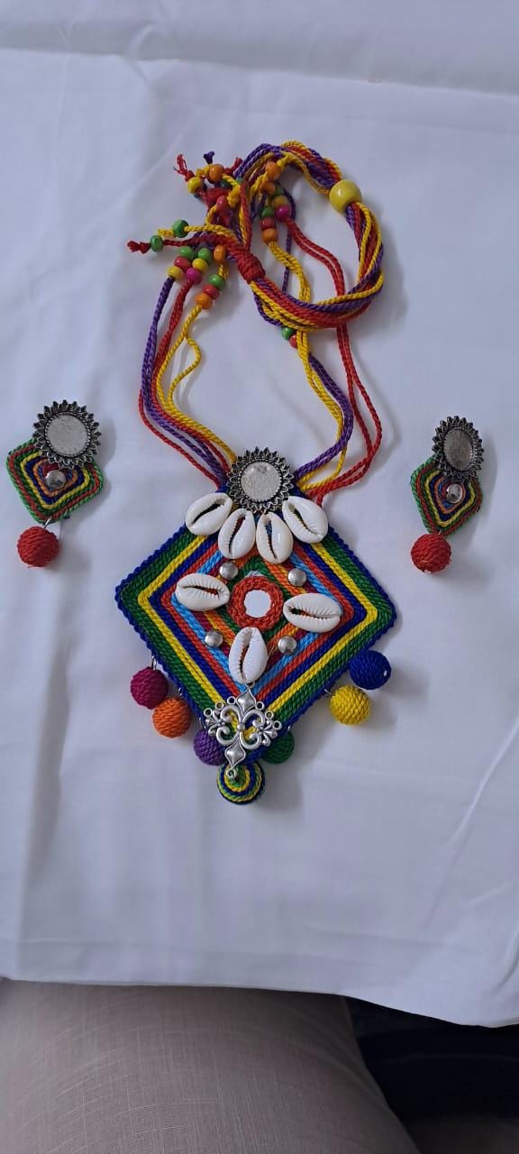 Exclusive multicoloured thread necklace set with shell n thread pendant n matching earrings