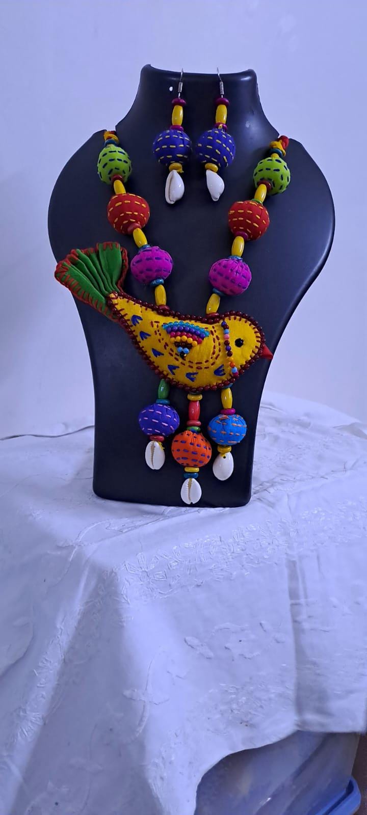 Exclusive fabric necklace with embroidered yellow fabric bird pendant and fabric beads n matching beads