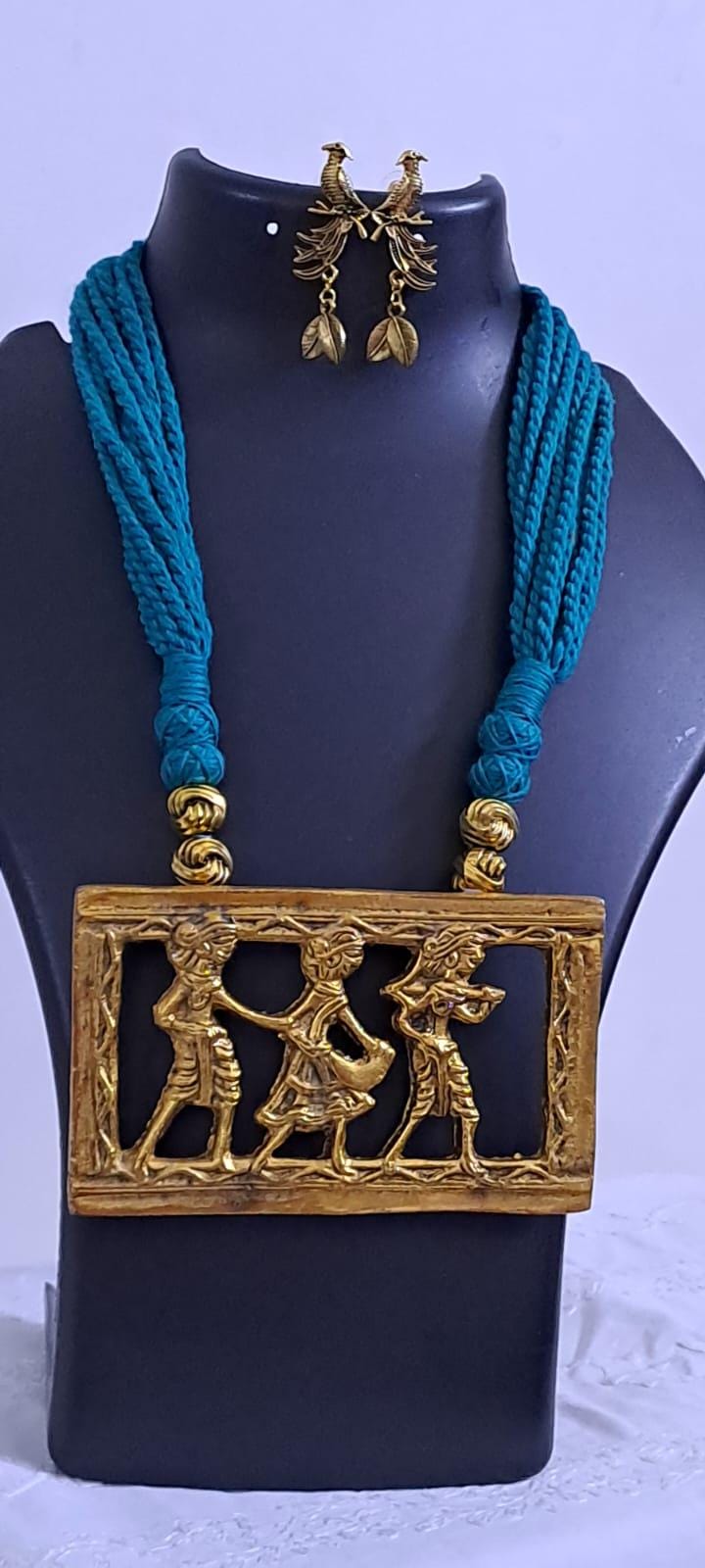 Sea green thread necklace set with dokra pendant n matching earrings