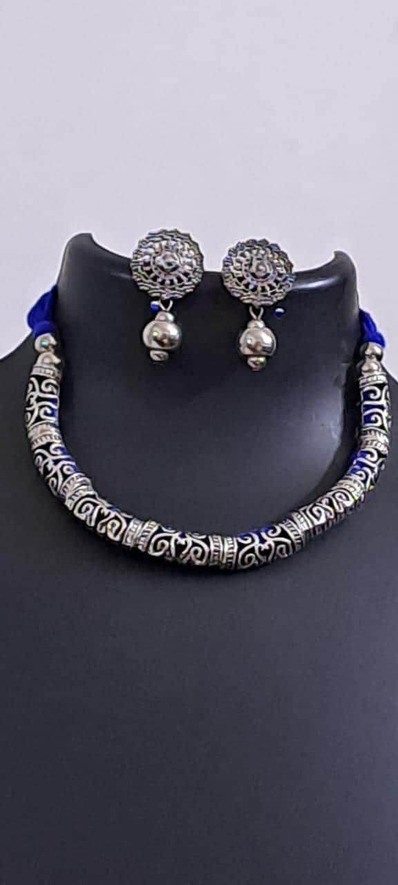 Exclusive silver oxidised hasuli set with matching earrings