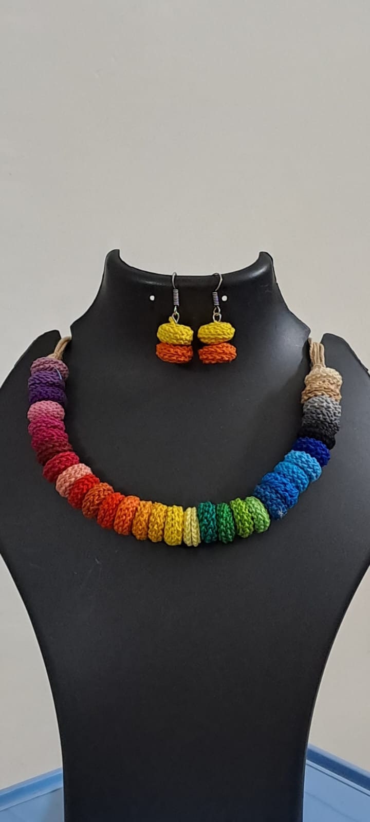 Exclusive multi coloured crochet necklace with colouful matching earrings.